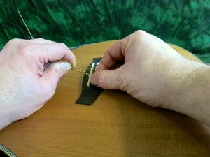 String change steel string – push end in