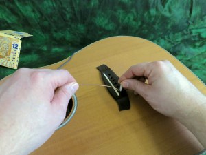 String change steel string – put pin in